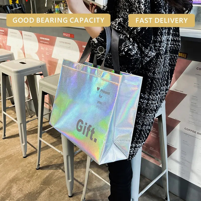 Sacos de compras não tecidos Logotipo personalizado para roupas recicladas reutilizáveis